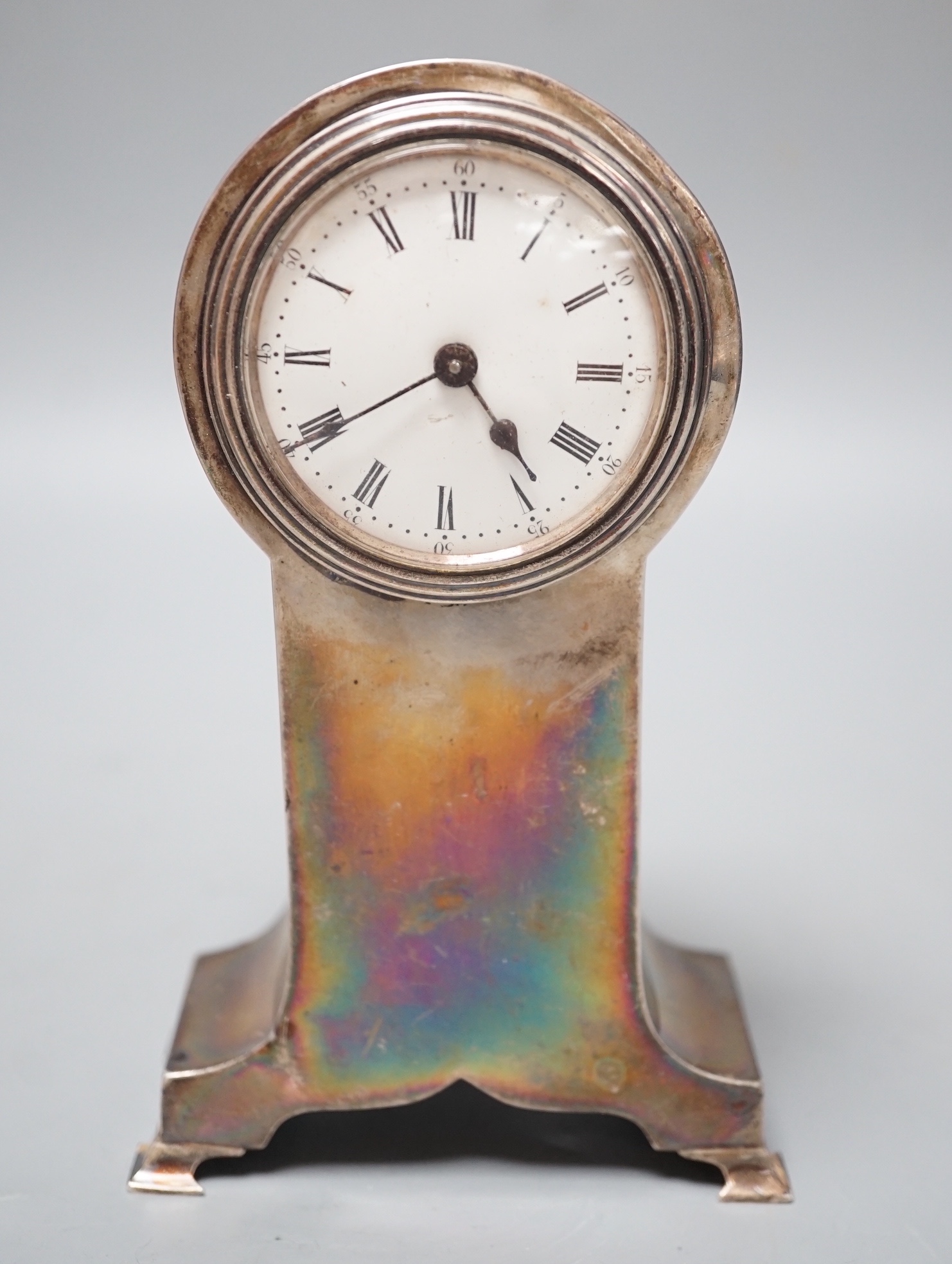 A George V silver mounted balloon cased timepiece, Birmingham, 1910, 17cm.